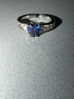 Heart-Cut Blue Stone Sterling-Color Ring with Accent Stones